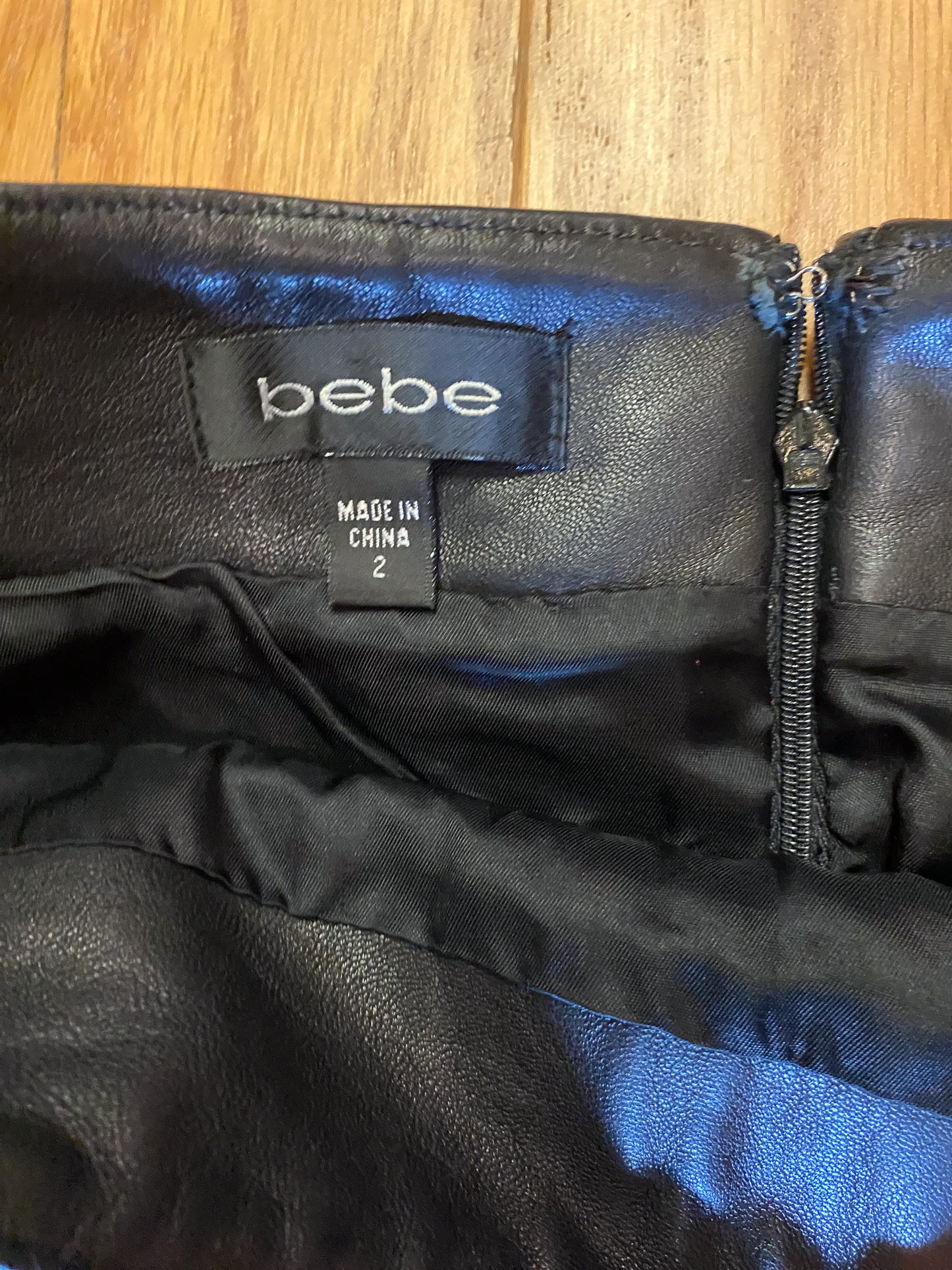 BEBE BLACK LEATHER JACKET + MINI SKIRT SET